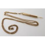 A 9ct gold tooth pick, length with bail 5.2cm, weight 6.1gms, with 9ct gold chain length 85cm,
