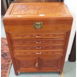 A Chinese hardwood carved cabinet, 81cm high x 56cm wide x 36cm deep Condition Report: Available