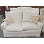 A Greengate furniture Oxford three seater sofa with feather filled cushions, 274cm wide with a