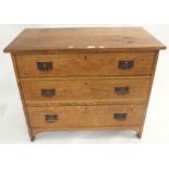 An oak Arts and Crafts three drawer chest, 76cm high x 91cm wide x 47cm deep Condition Report: