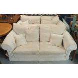 Two beige three seater sofas with scatter cushions (2) Condition Report: Available upon request
