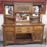 A Victorian oak mirror backed sideboard, 191cm high x 182cm wide x 56cm deep Condition Report: