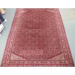 A large Wilton carpet, 369cm x 278cm Condition Report: