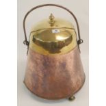 A Copper and brass coal bucket Condition Report: Available upon request