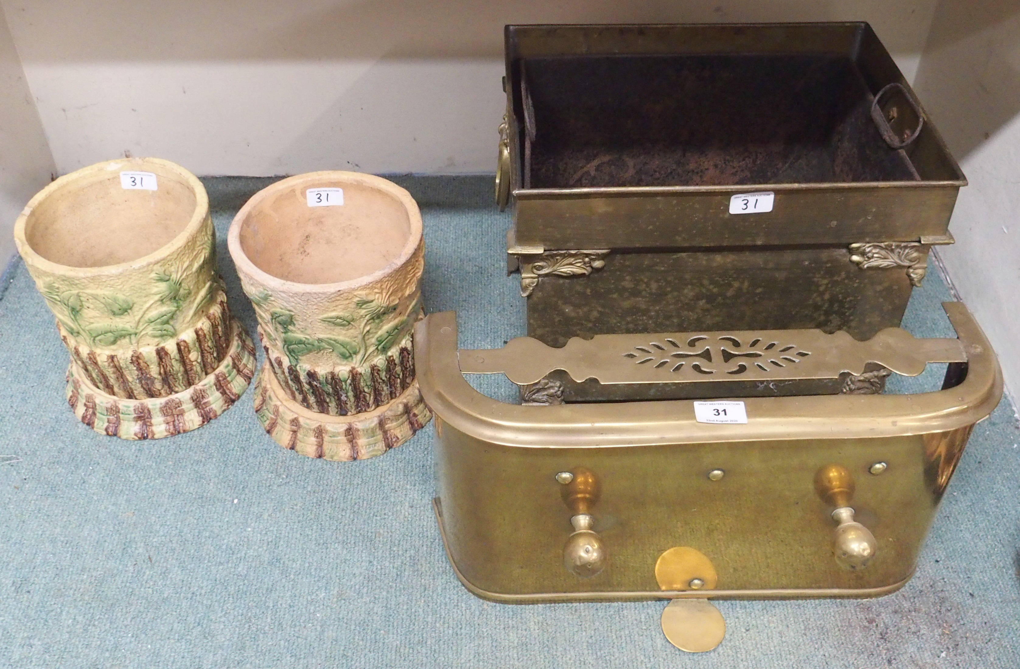 A pair of ceramic planters, a coal box and fender (4) Condition Report: Available upon request