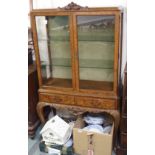 A walnut display cabinet, 159cm high x 94cm wide x 41cm deep Condition Report: Available upon