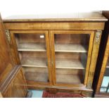 An inlaid mahogany pier cabinet with two glazed doors, 104cm high x 106cm wide x 33cm deep Condition