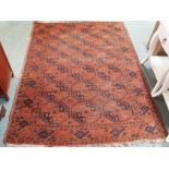 A red ground Turkmen rug, 195cm x 146cm Condition Report: Available upon request