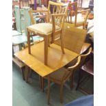 A mid-Century extending dining table with two carvers and four dining chairs (7) Condition Report: