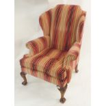 A Greengate Furniture Ltd striped wingback chair and cushions, 108cm high Condition Report: