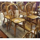 A set of four wheel back chairs (4) Condition Report: Available upon request