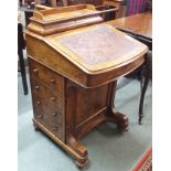 A Victorian walnut inlaid Davenport Condition Report: Available upon request