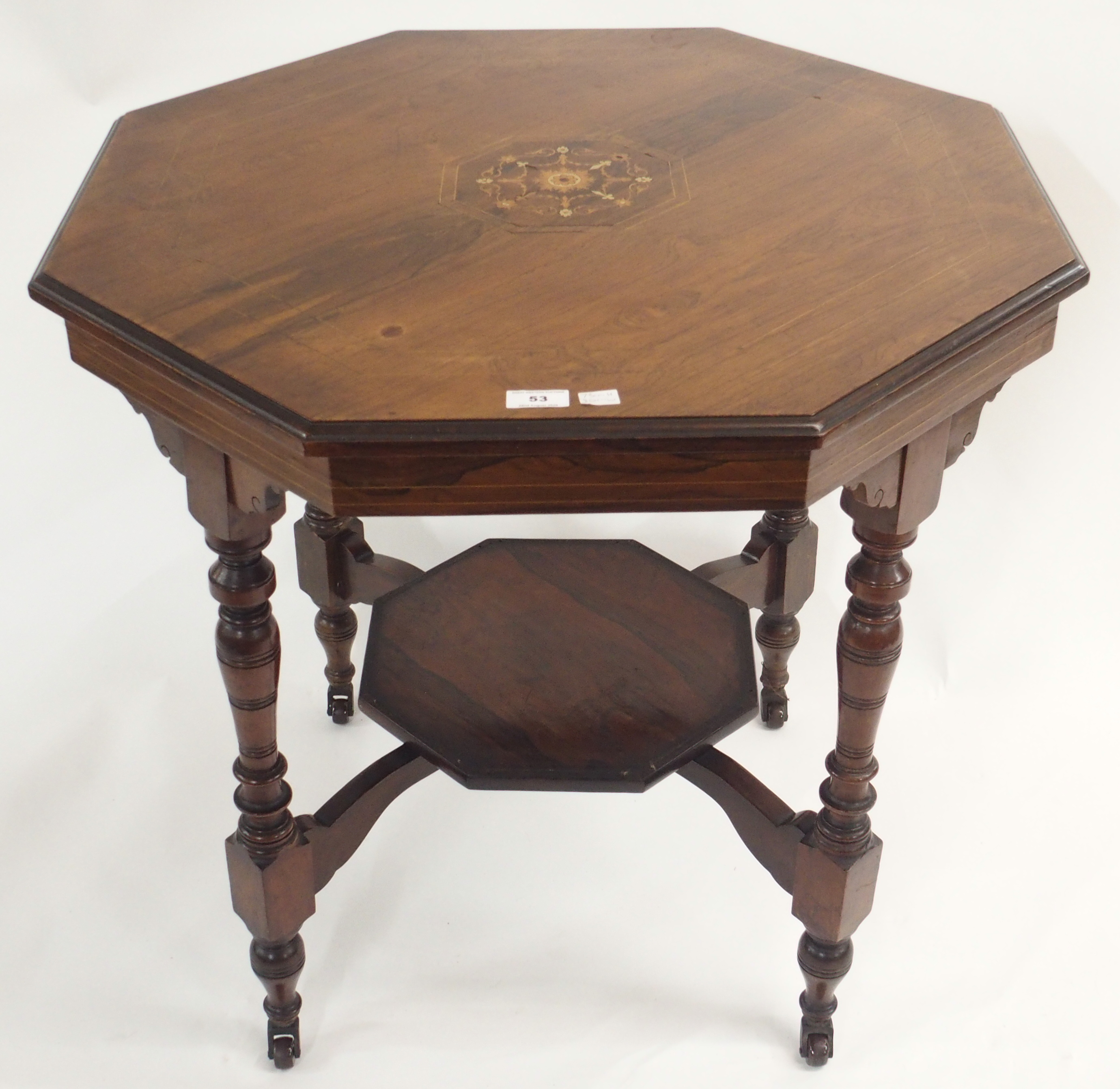 An inlaid rosewood octagonal window table, 73cm high x 80cm wide x 80cm deep Condition Report: