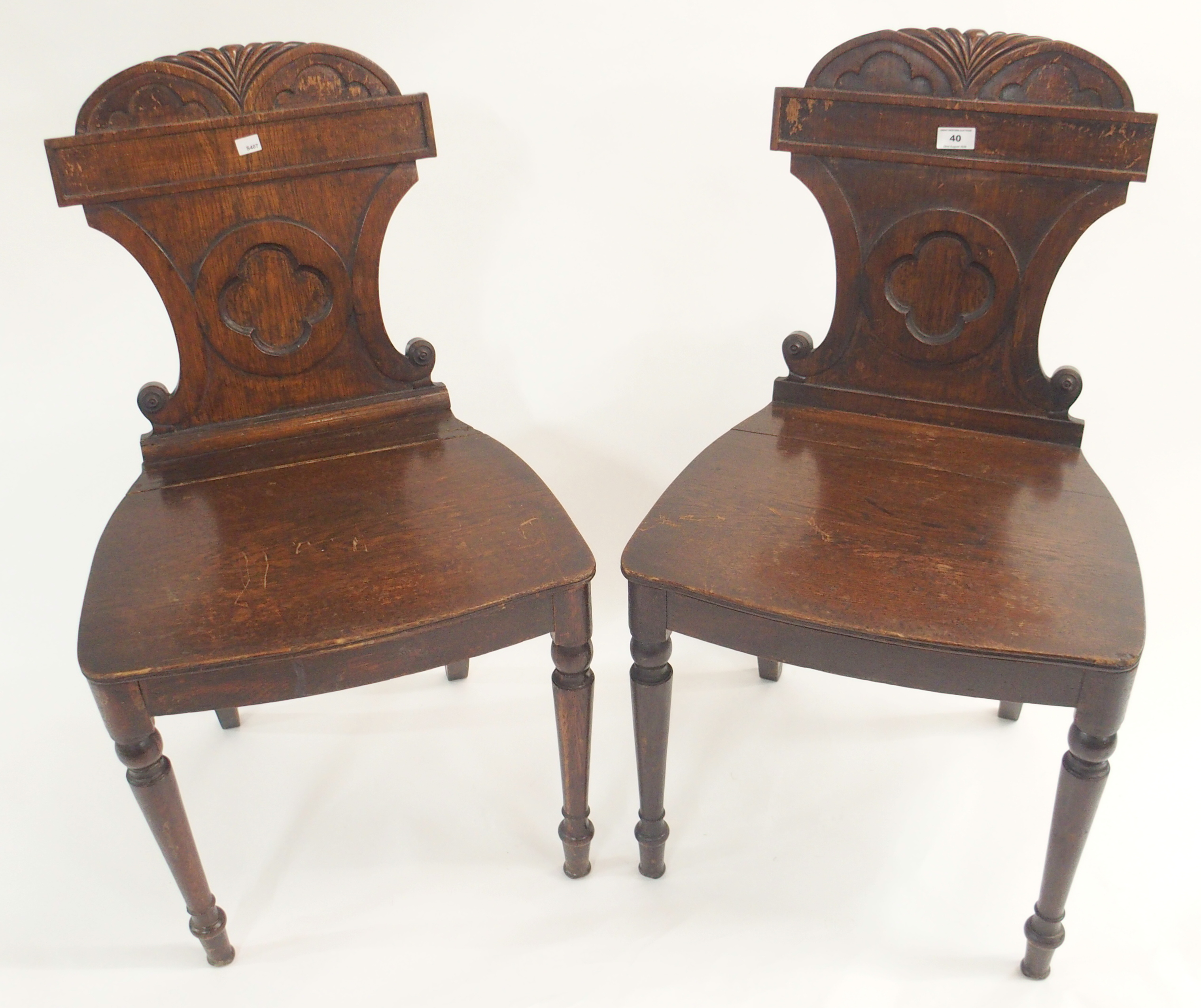 A pair of Victorian oak hall chairs (2) Condition Report: