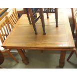 An oak extending dining table, 75cm high x 91cm wide x 91cm deep Condition Report: Available upon