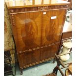 A mahogany drinks cabinet, 143cm high x 93cm wide x 38cm deep Condition Report: locked, no key.