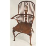 An elm and yew Windsor chair Condition Report:
