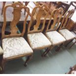 A set of four walnut dining chairs (4) Condition Report: