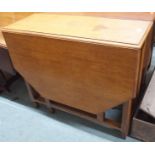 An oak drop leaf table Condition Report: Available upon request