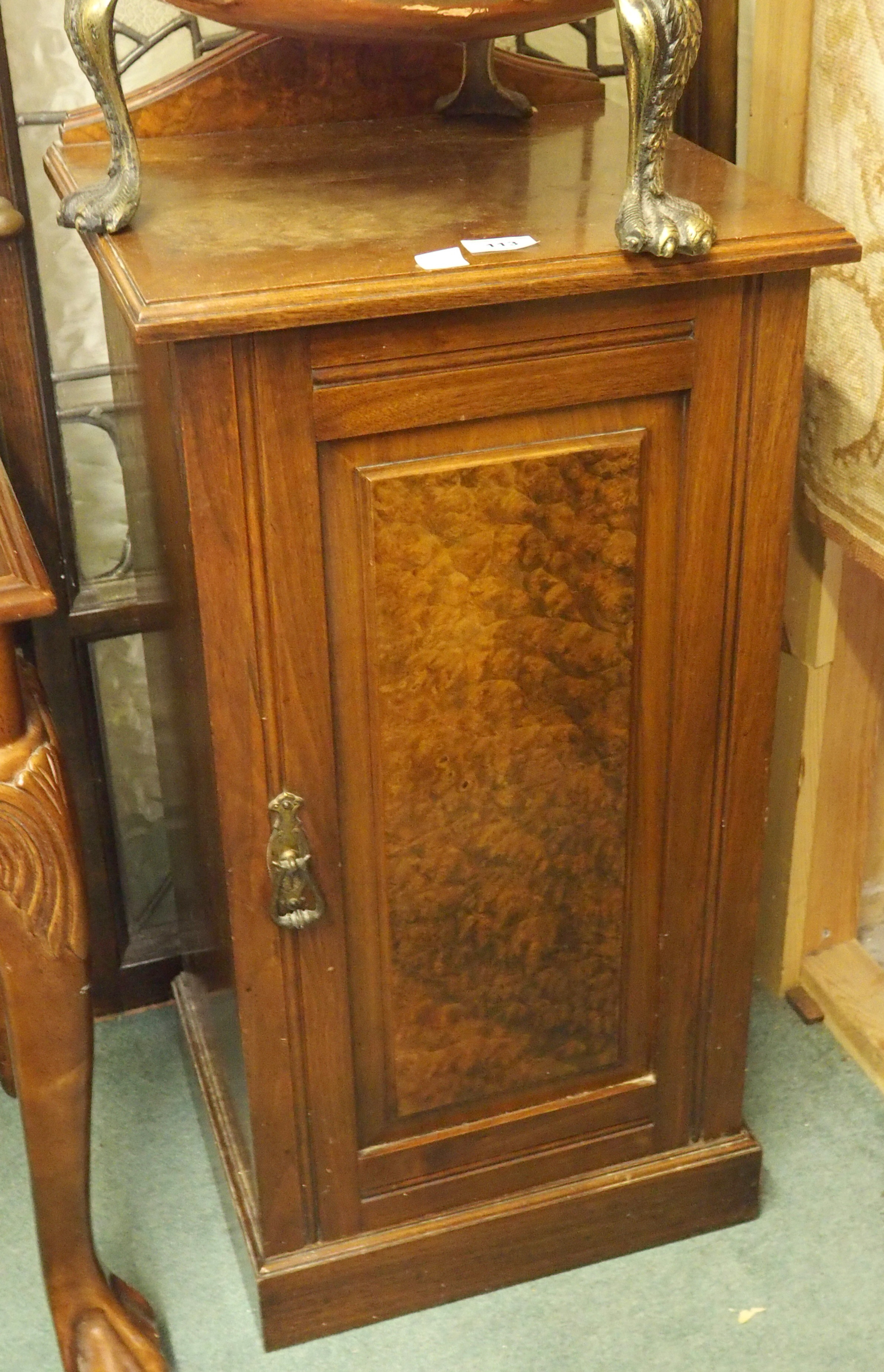 A mahogany bedside cabinet Condition Report: Available upon request