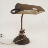 A metal desk lamp Condition Report: Available upon request
