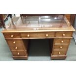 A mahogany twin pedestal desk, 76cm high x 114cm wide x 58cm deep Condition Report: Available upon
