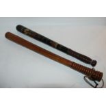A painted Victorian truncheon and another hardwood truncheon (2) Condition Report: Available upon