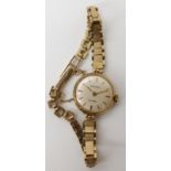 A 9ct gold ladies Rotary watch, length of strap 17.5cm, weight including mechanism 15.1gms Condition