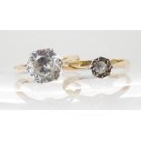 A 9ct gold zircon ring, size I1/2 and a 9ct gold illusion set zircon ring, size J1/2, combined