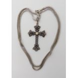 A continental yellow and white metal diamond and pearl set cross with a silver herringbone chain
