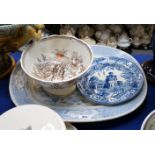 A pottery punch bowl in Charity pattern, a blue and white pearlware plate and a large platter