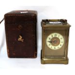A brass and glass carriage clock with travelling case Condition Report: Available upon request