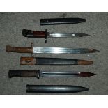 Three various bayonets Condition Report: Available upon request