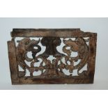 Two early oak carved panels, 30 x 22cm and decorative pipe Condition Report: Available upon request
