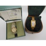 A ladies Steel and gold colour Gucci watch together with a watch by Mulberry Condition Report: No