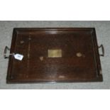 A two handled tea tray with brass plaque inscribed Presented by Rowntree & Co Ltd, York and a