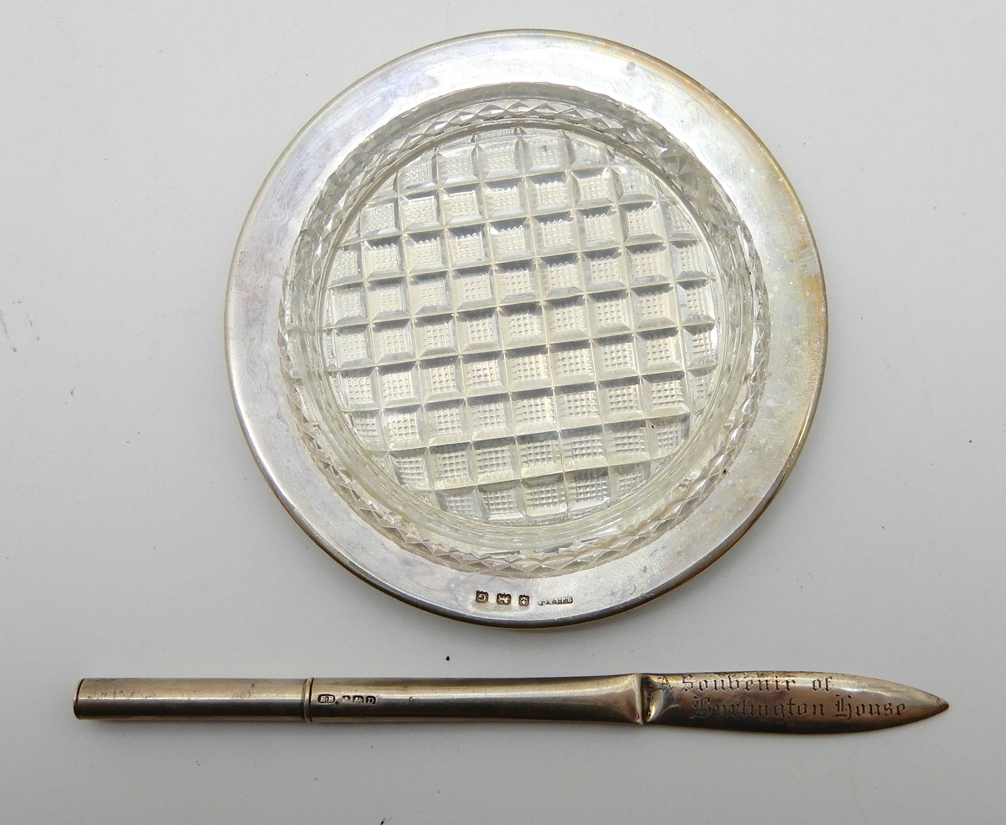 A lot comprising a silver cigarette box, a silver topped sugar castor, silver sugar tongs, silver - Image 2 of 6