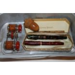 Two fountain pens, opera glasses and acorn needle case Condition Report: Available upon request