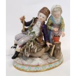 A Meissen figure of Winter, modelled as a boy seated upon a sledge holding an axe beside a girl