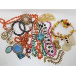 A Ruskin plaque brooch, banded agate beads, a fruit headdress and other items Condition Report: No