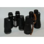 Two pairs of binoculars Condition Report: Available upon request