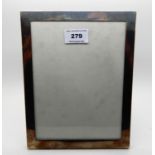 A silver mounted photo frame, rubbed marks, 23.5cm x 18cm, aperture 20cm x 15cm Condition Report:
