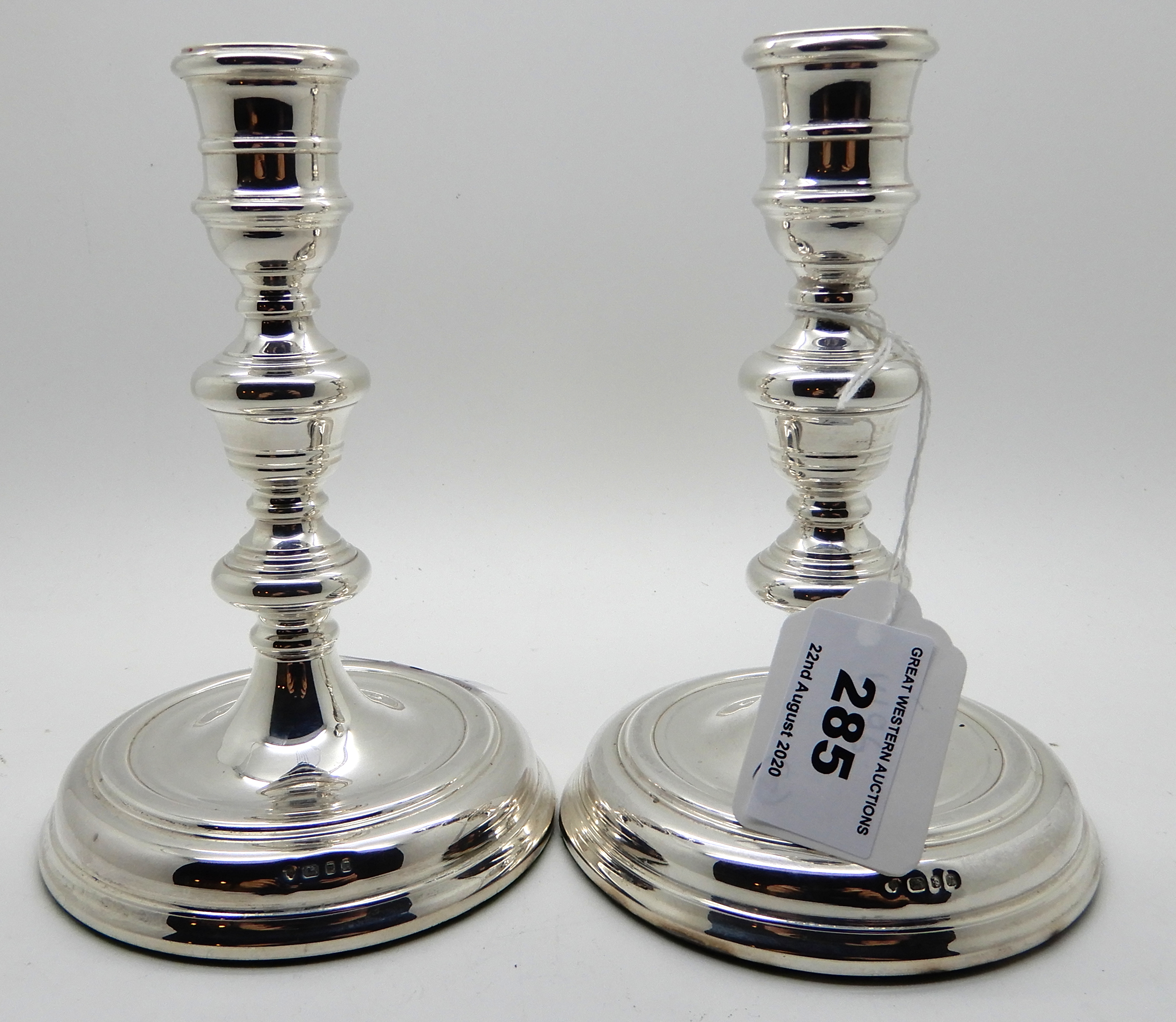 A pair of silver candlesticks, London hallmarks, knopped stems on circular pedestal bases 15cm high, - Image 2 of 3