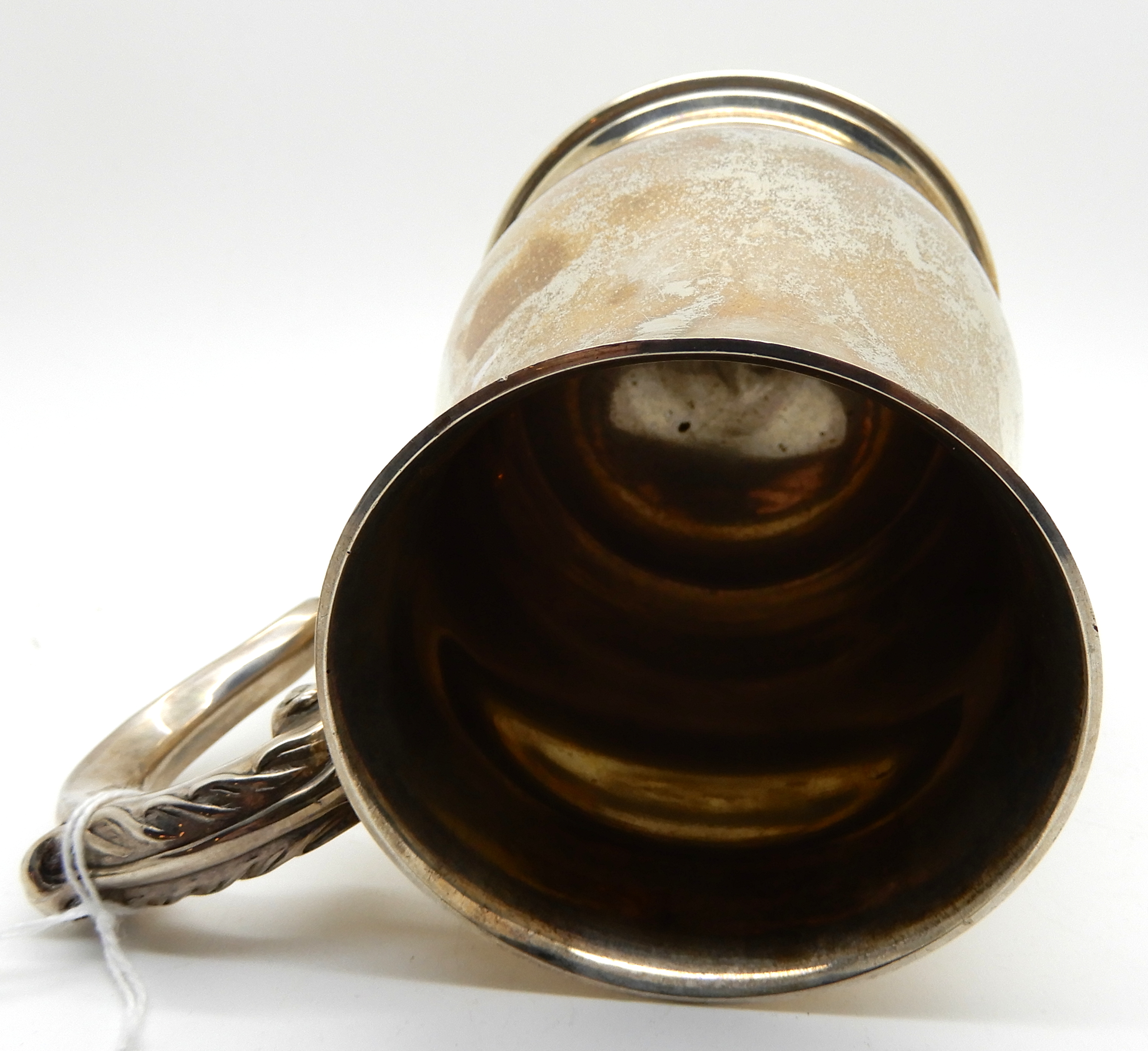 A silver tankard, Birmingham 1965, of baluster form and scrolling handle, 12.5cm high, 393gms - Image 5 of 5