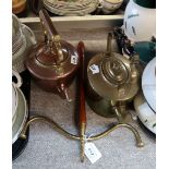 A hanging wool winder, together with a brass and a copper kettle Condition Report: No condition