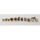 A collection of gold and yellow metal earrings to include amethyst pearl etc, combined weight 7.4gms