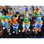 Assorted colourful Murano glass clowns Condition Report: