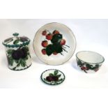 A collection of Wemyss pottery including a plum decorated jar and cover 16cm high painted and