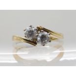 A 14k gold twin stone cubic zirconia ring, size M1/2, weight 2.6gms Condition Report: Available upon