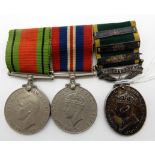 A WWII group of three including the territorial efficiency medal to 3242087 Sjt. T Rumbsay, R.A.